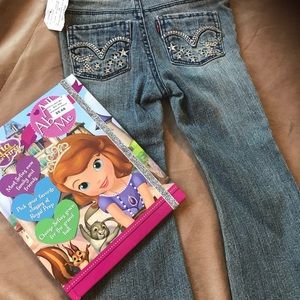 Brand new Levi’s girls Size 2T. And free book.